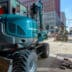 machinaal-aanbrengen-van-bestrating-aan-de-haagse-loper-in-den-kopieren